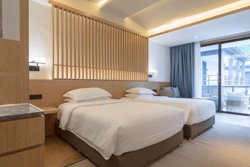 Howard Johnson Huashuiwan Hot Springs Resort Chengdu Ruang foto