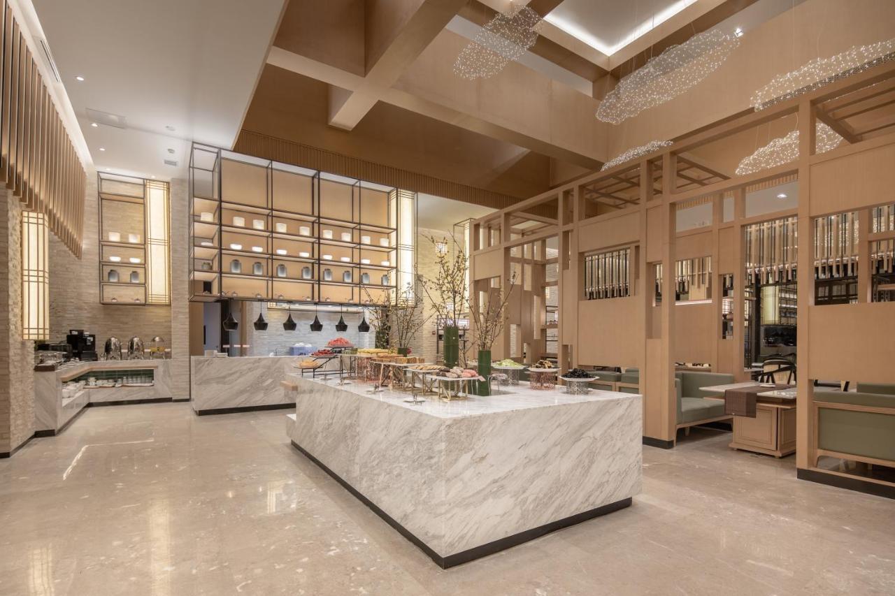 Howard Johnson Huashuiwan Hot Springs Resort Chengdu Bagian luar foto
